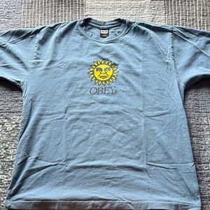 Obey Blue and Yellow Short Sleeve Tee with Sun Design